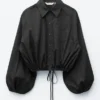 Camisa corta con cordón