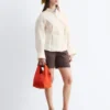 Camisa de lino con pliegues en la cintura