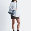 Camisas a rayas con bolsillos de parche