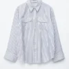 Camisas a rayas con bolsillos de parche