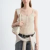 Camiseta sin mangas con dobladillo festoneado