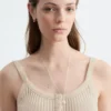 Camiseta sin mangas con dobladillo festoneado