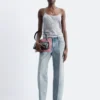 Camisola de jacquard de satén transparente