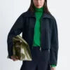 Chaqueta con mangas esculturales