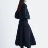 Chaqueta con mangas esculturales
