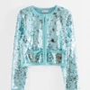 Chaqueta de punto con adornos de lentejuelas