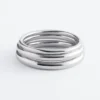 Conjunto de brazaletes tubulares