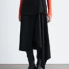 Falda midi cruzada asimétrica