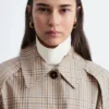 Gabardina con cinturón de hebilla a cuadros