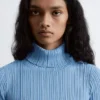 Jersey de cuello alto de punto acanalado con lurex
