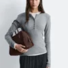 Jersey de lana con media tapeta
