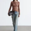 Jersey de lana con media tapeta