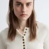 Jersey de lana merina con media tapeta