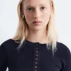 Jersey de lana merina con media tapeta