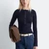Jersey de lana merina con media tapeta