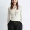 Jersey de lana merina con media tapeta