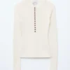 Jersey de lana merina con media tapeta