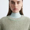 Jersey de lana merina con puntadas decorativas