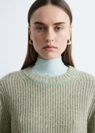 Jersey de lana merina con puntadas decorativas