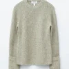 Jersey de lana merina con puntadas decorativas
