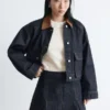 Minifalda de denim plisada