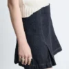 Minifalda de denim plisada