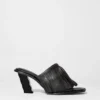 Mules de cuero con flecos