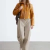 Pantalones de algodón con pliegues