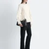 Pantalones entallados con pliegues marcados