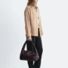 Pantalones entallados con pliegues marcados
