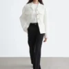 Pantalones rectos con pliegues marcados