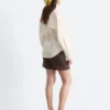 Camisa de lino con pliegues en la cintura