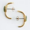 Pendientes de botón con detalle de ear cuff