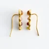 Pendientes de oreja con varias piedras
