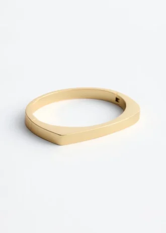 Pulsera tipo brazalete angular