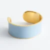 Pulsera tipo brazalete en dos tonos