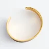 Pulsera tipo brazalete en dos tonos