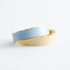 Pulsera tipo brazalete en dos tonos