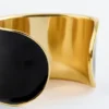 Pulsera tipo brazalete en dos tonos
