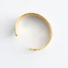 Pulsera tipo brazalete en dos tonos