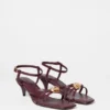 Sandalias de tacón y adornos