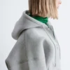 Sudadera corta con capucha y cremallera de neopreno