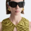 Top con cuello en forma de ojo de cerradura y fruncidos