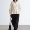 Top de algodón con peplum