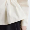 Top de algodón con peplum
