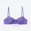 Top de bikini con aros y detalle de lazo