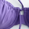 Top de bikini con aros y detalle de lazo