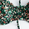 Top de bikini con aros y detalle de lazo
