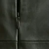 Top de cuero con hombros retorcidos