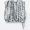 Top de seda con cordones